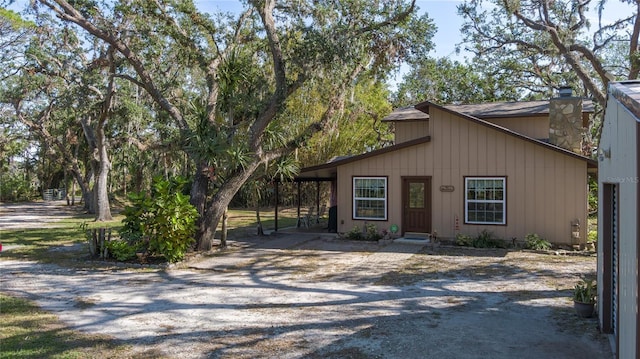 view of front of property with a carport