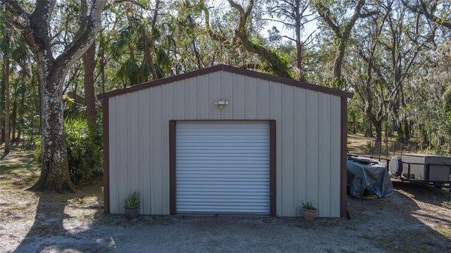 view of outdoor structure with a garage