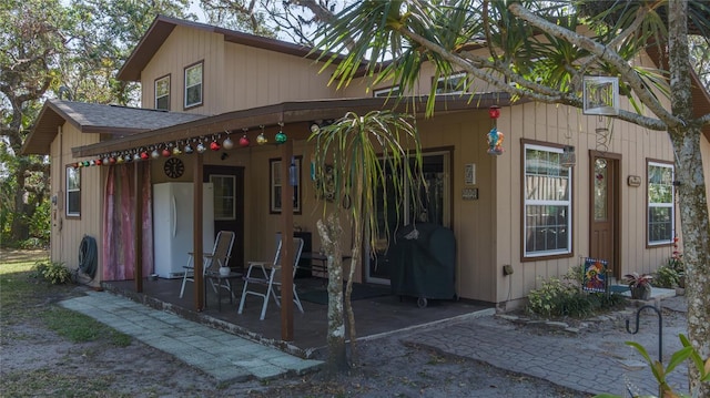 back of house featuring a patio area