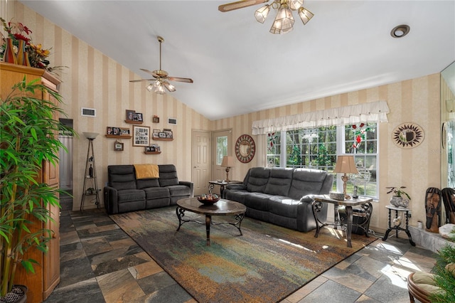 living room with ceiling fan and lofted ceiling