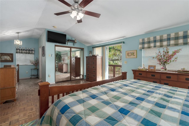 bedroom featuring dark parquet floors, access to outside, ceiling fan, and lofted ceiling