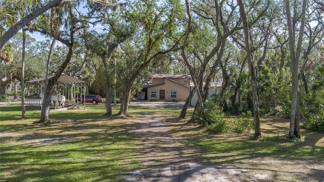 exterior space featuring a gazebo and a front lawn