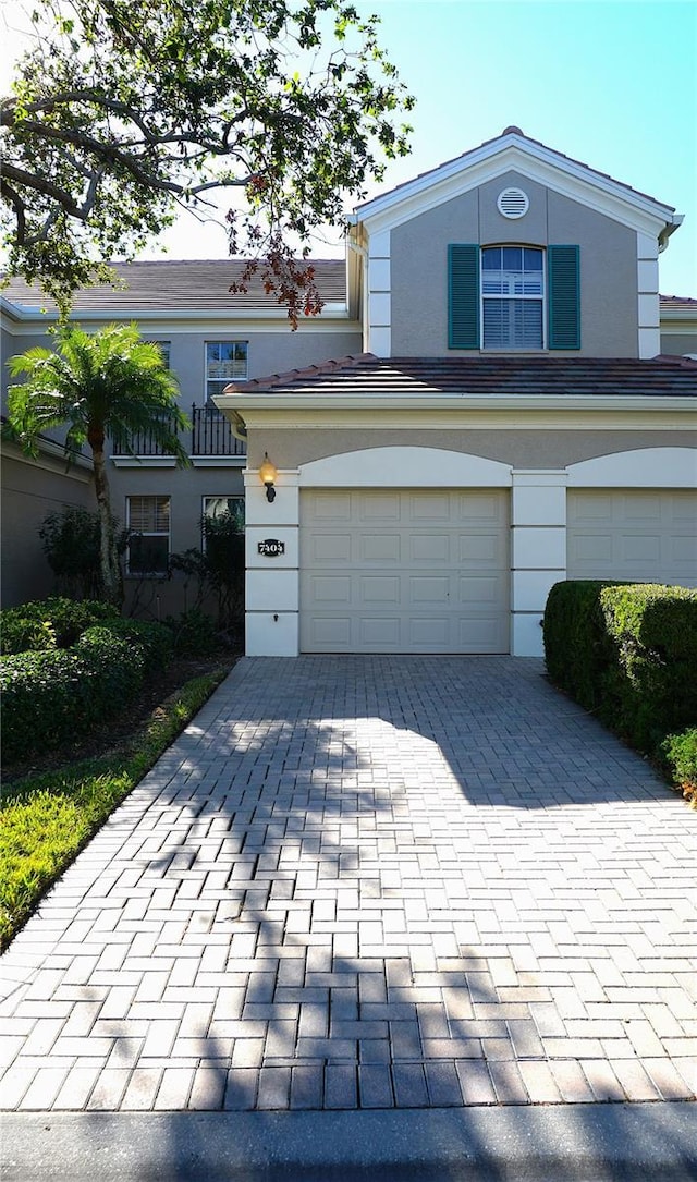 front facade with a garage