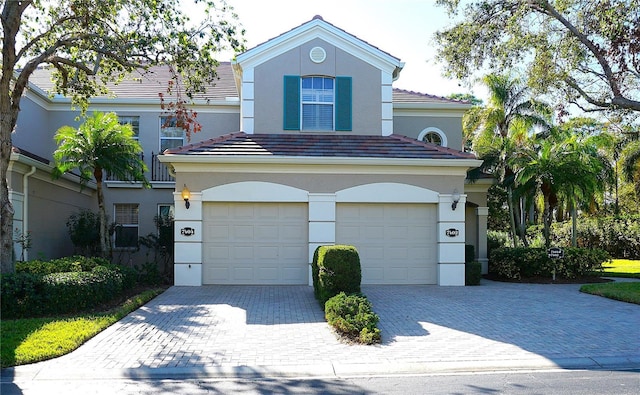 view of front of property featuring a garage