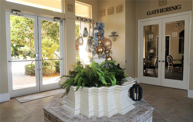 doorway featuring a wealth of natural light and french doors