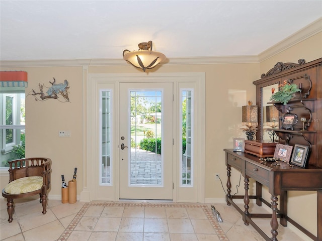 doorway to outside with ornamental molding and light tile patterned floors