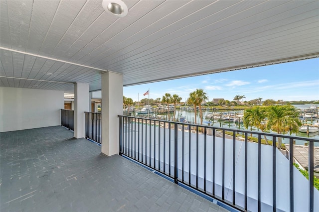 balcony featuring a water view