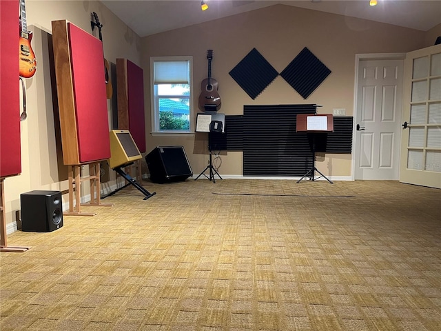 carpeted living room featuring lofted ceiling