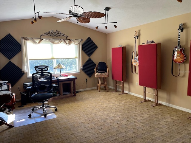 carpeted office featuring ceiling fan and vaulted ceiling