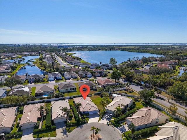 drone / aerial view featuring a water view