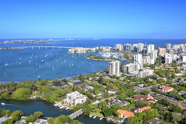 birds eye view of property featuring a water view