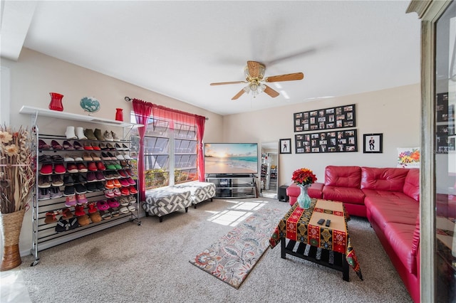 living room with carpet flooring and ceiling fan