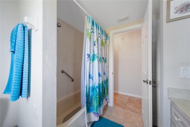 bathroom with tile patterned floors, vanity, and shower / tub combo with curtain