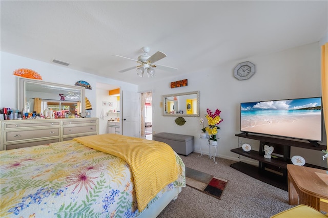 carpeted bedroom with connected bathroom and ceiling fan