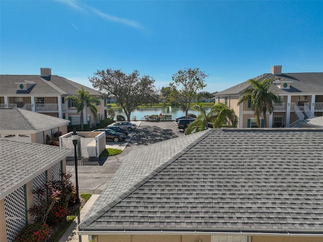 view of home's community featuring a water view