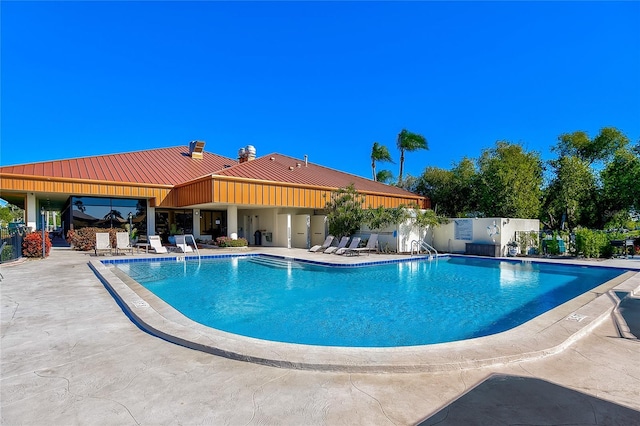 view of pool featuring a patio area