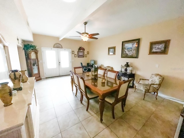 dining area with ceiling fan, beam ceiling, light tile patterned floors, and french doors