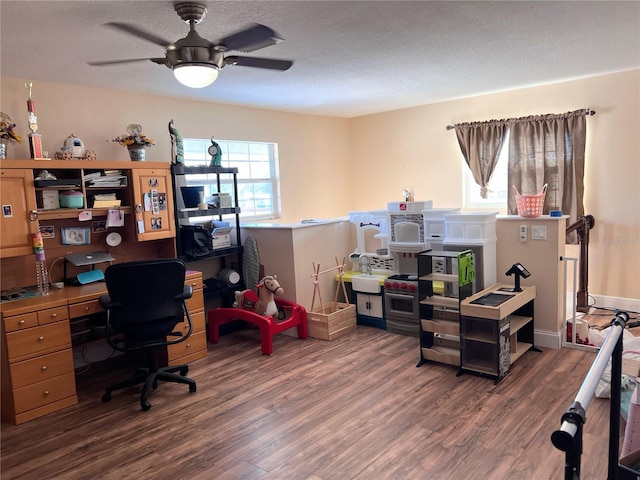 office area with hardwood / wood-style floors, a textured ceiling, and ceiling fan