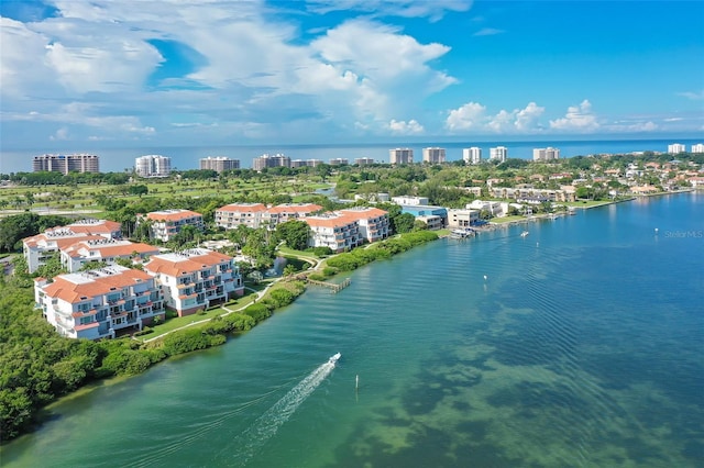 birds eye view of property featuring a water view