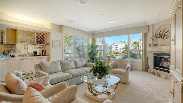 carpeted living room with bar