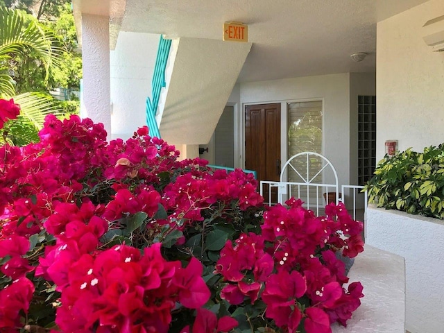 350 Gulf Of Mexico Dr Unit 211, Longboat Key, FL 34228 - exterior view of stucco siding
