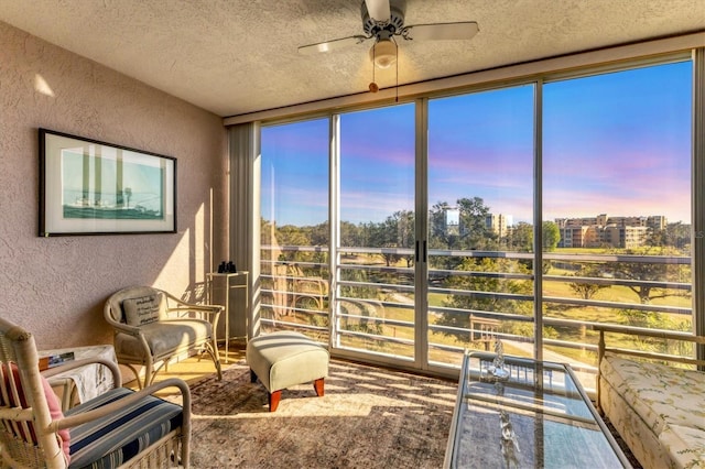 sunroom featuring a view of city