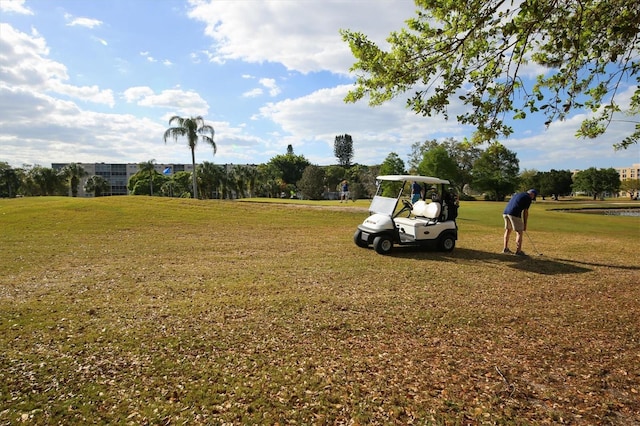 view of home's community featuring a lawn