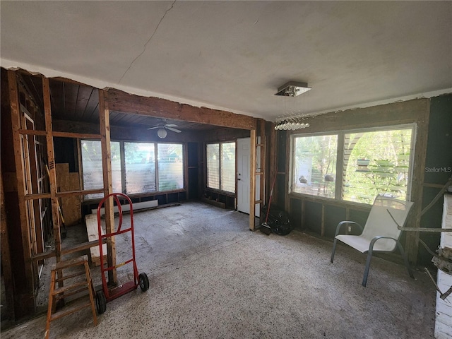 misc room with ceiling fan and a healthy amount of sunlight