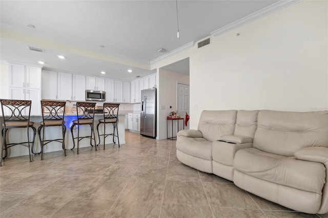 living room featuring ornamental molding