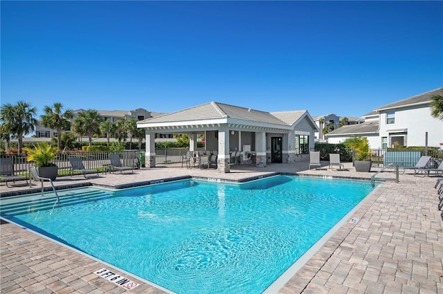 view of swimming pool featuring a patio area