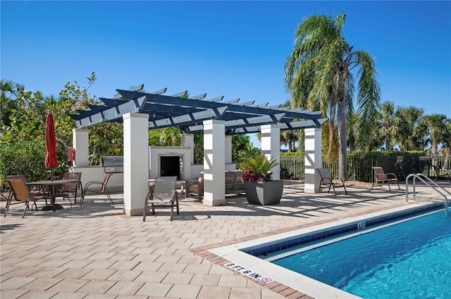 view of swimming pool featuring a grill, a pergola, and a patio