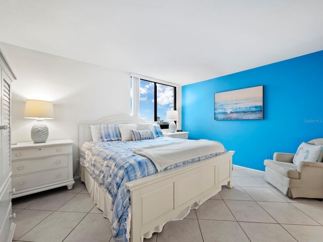 bedroom with light tile patterned flooring