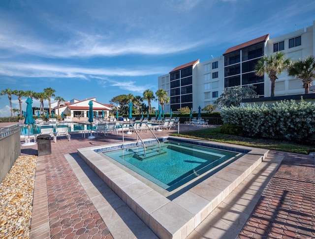 2045 Gulf Of Mexico Dr Unit M1-502, Longboat Key, FL 34228 - community pool featuring a patio