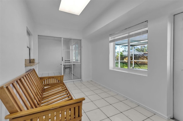 sitting room with light tile patterned floors