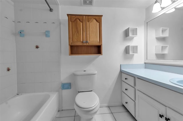 full bathroom with tile patterned floors, vanity, toilet, and tiled shower / bath combo