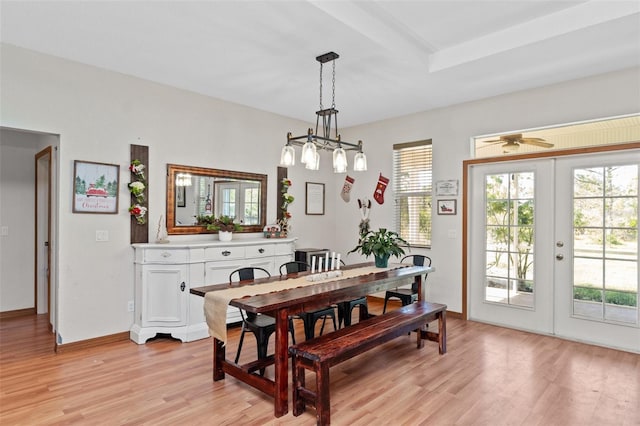 dining area featuring french doors, light hardwood / wood-style flooring, and ceiling fan