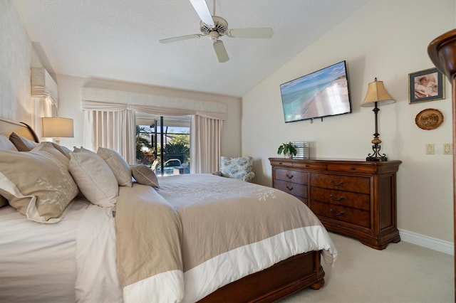 bedroom featuring access to exterior, ceiling fan, light carpet, and vaulted ceiling