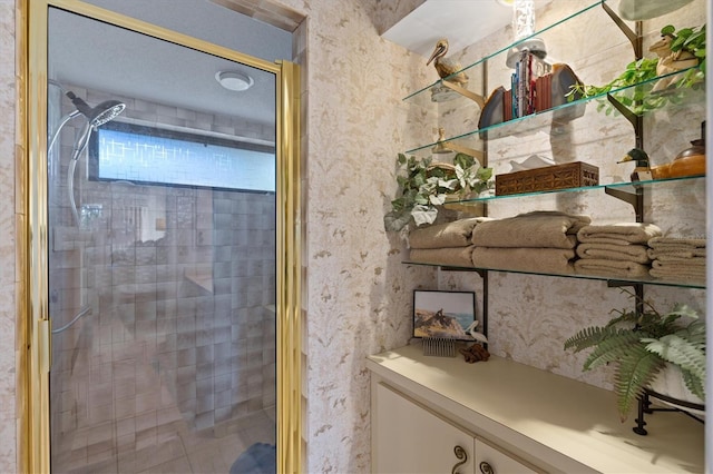 bathroom with a shower with shower door