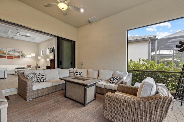 view of patio featuring a lanai and an outdoor hangout area