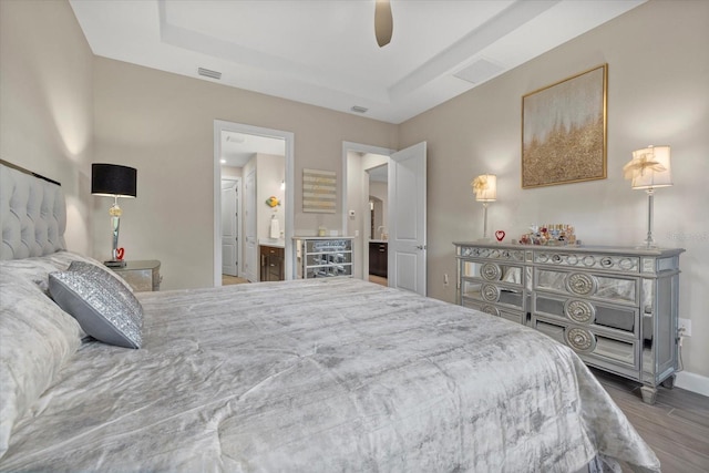 bedroom featuring hardwood / wood-style floors and ceiling fan