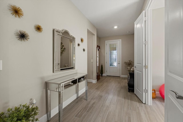 hall featuring light hardwood / wood-style flooring