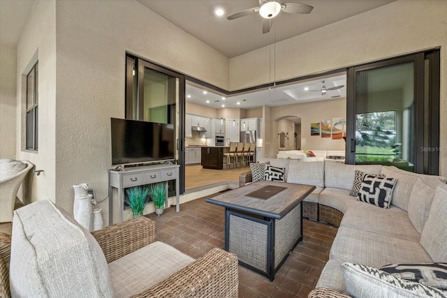 living room with ceiling fan