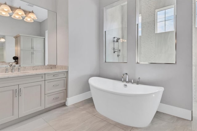 bathroom featuring tile patterned floors, separate shower and tub, and vanity