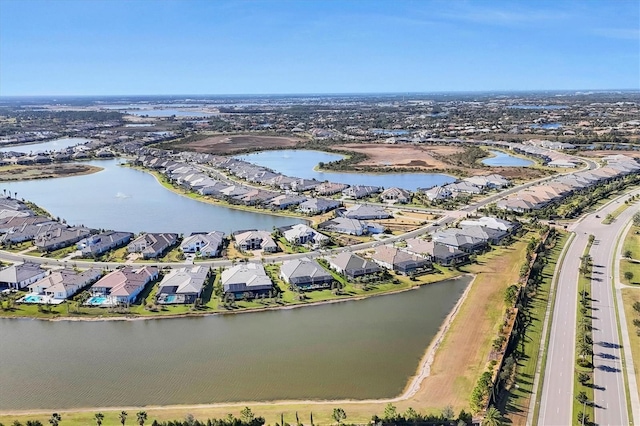 drone / aerial view with a water view