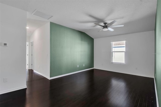 unfurnished room featuring wood-type flooring, a textured ceiling, ceiling fan, and lofted ceiling