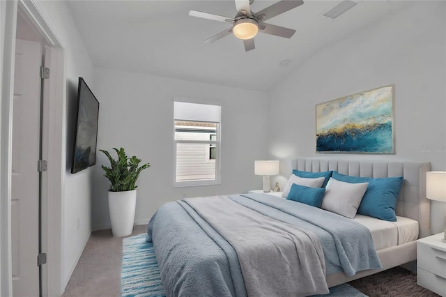 bedroom with carpet, ceiling fan, and lofted ceiling