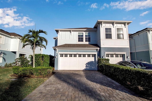 view of front of home with a garage