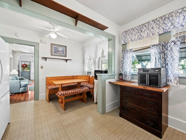 interior space featuring light hardwood / wood-style flooring and ceiling fan