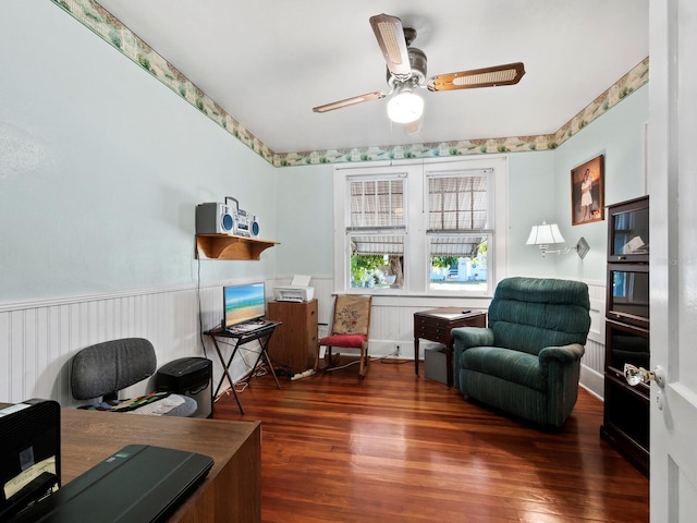 office with dark hardwood / wood-style floors and ceiling fan