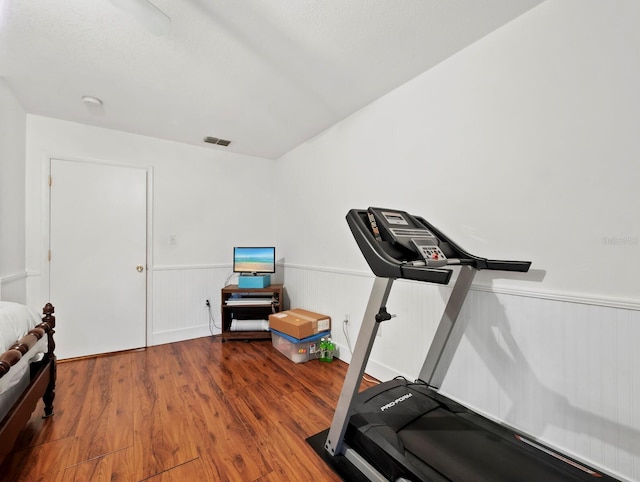 workout area featuring wood-type flooring